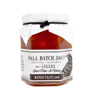 Jar of Small Batch Jam Co. Mango Tajin Jam on a white background